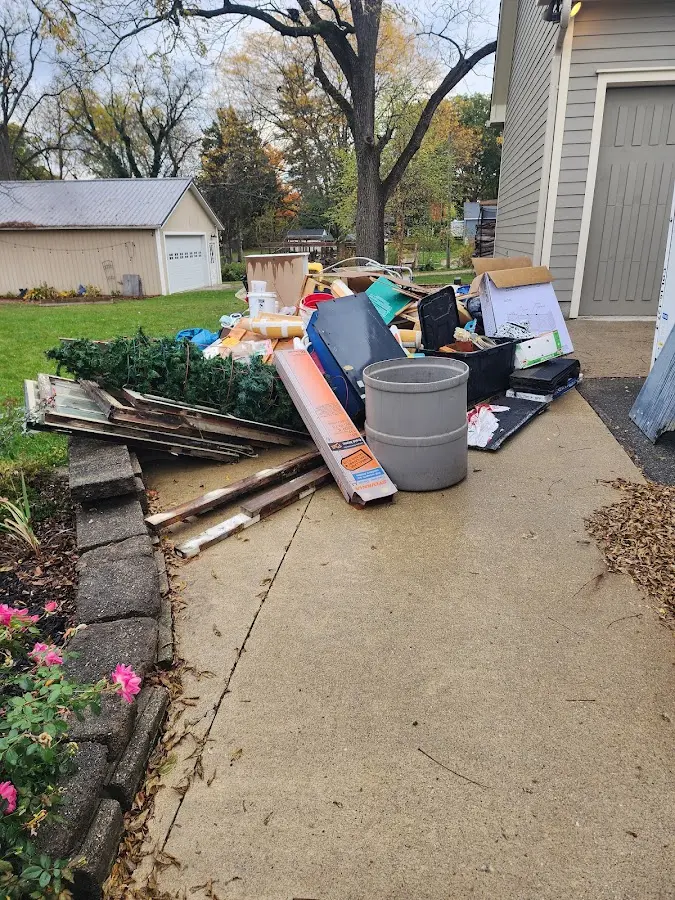 Dumpster being loaded with debris for 30 Yard Dumpster Rental in Snohomish